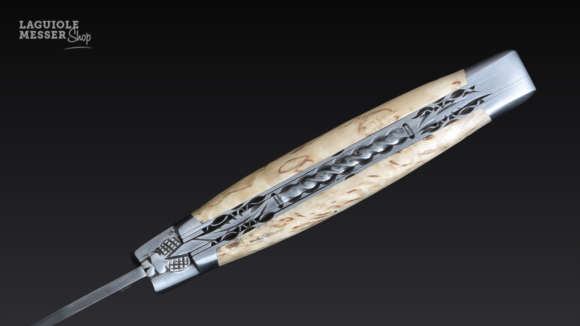 Detailaufnahme Laguiole en Aubrac, Ressort dorsadée, Doppelplatine und geschmiedeter Biene