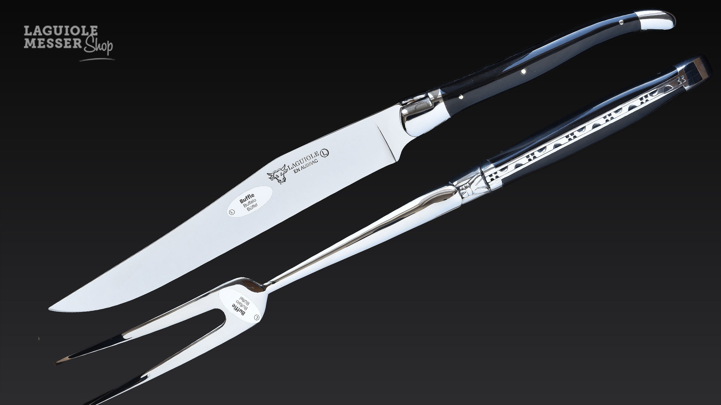 Tranchiermesser und Fleischgabel mit Griffen aus Büffelhorn von Laguiole en Aubrac