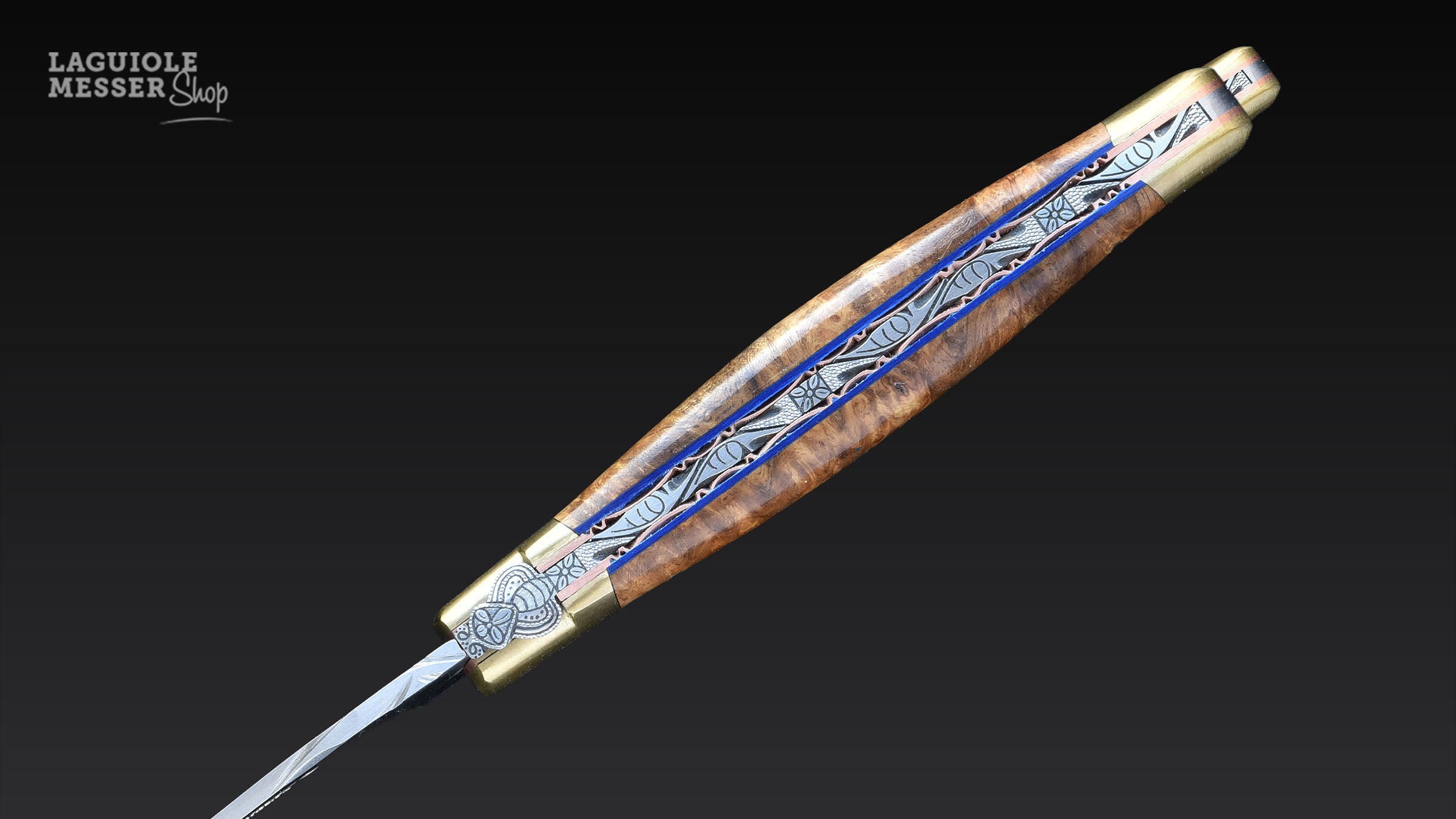 Handgraviertes Ressort mit symmetrischer Linienführung