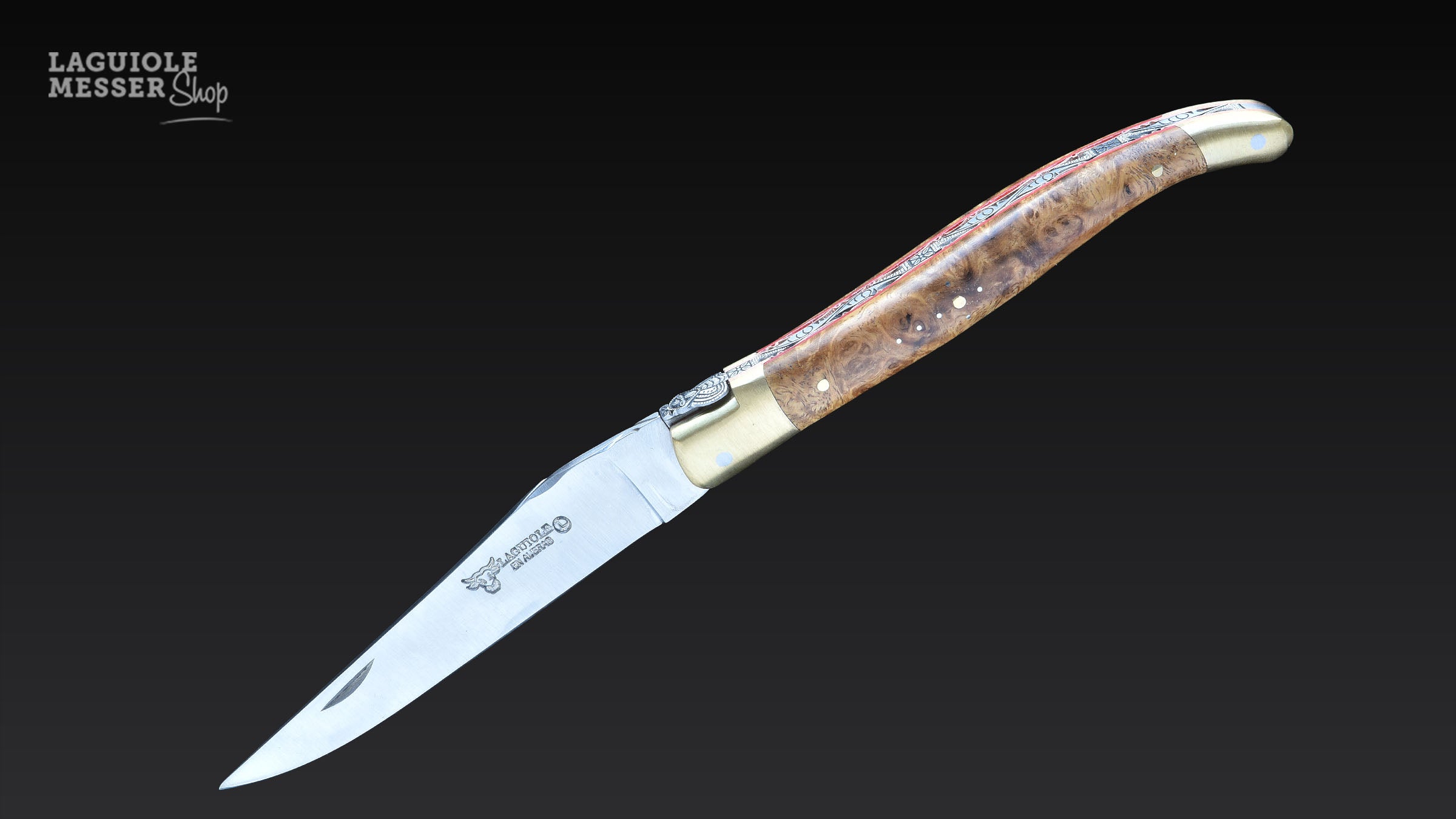 Meistermesser mit Griff aus Loupe d’Amboine dorée und Messingbacken und roter Einfassung