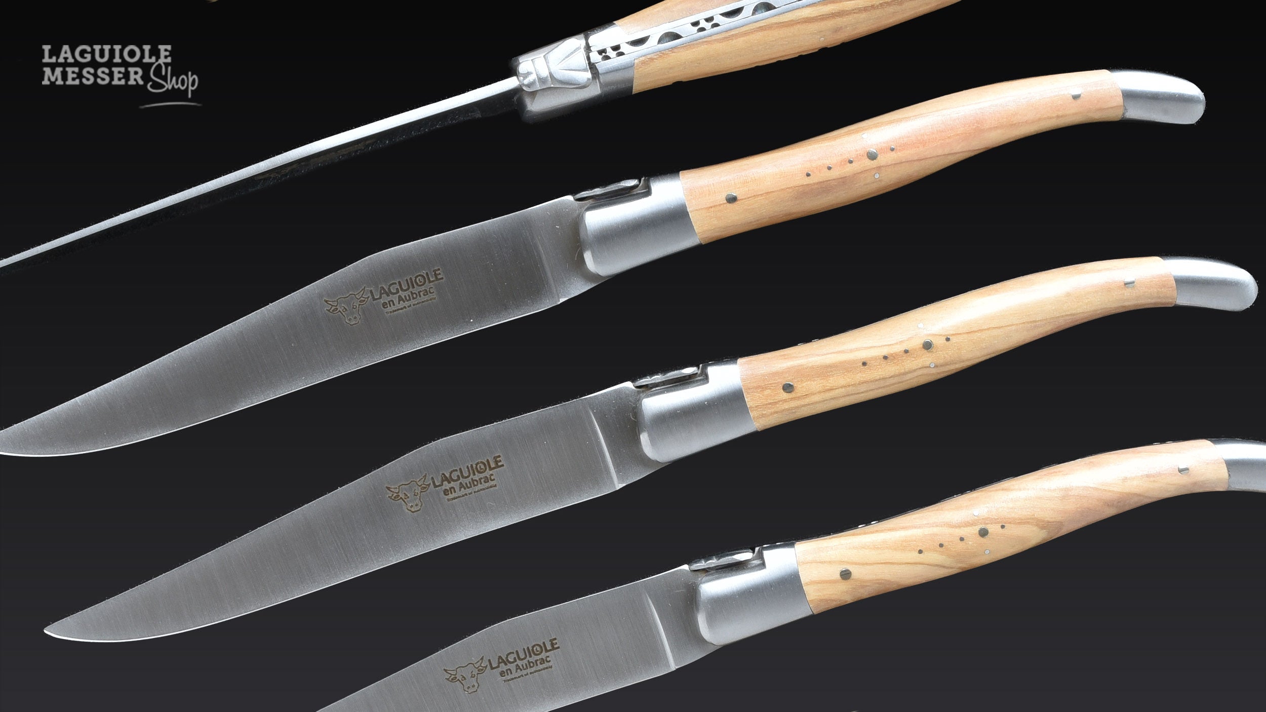 Laguiole en Aubrac Steakmesserset mit Olivenholzgriffen, Lasergravur und satinierten Klingen und Heftbacken