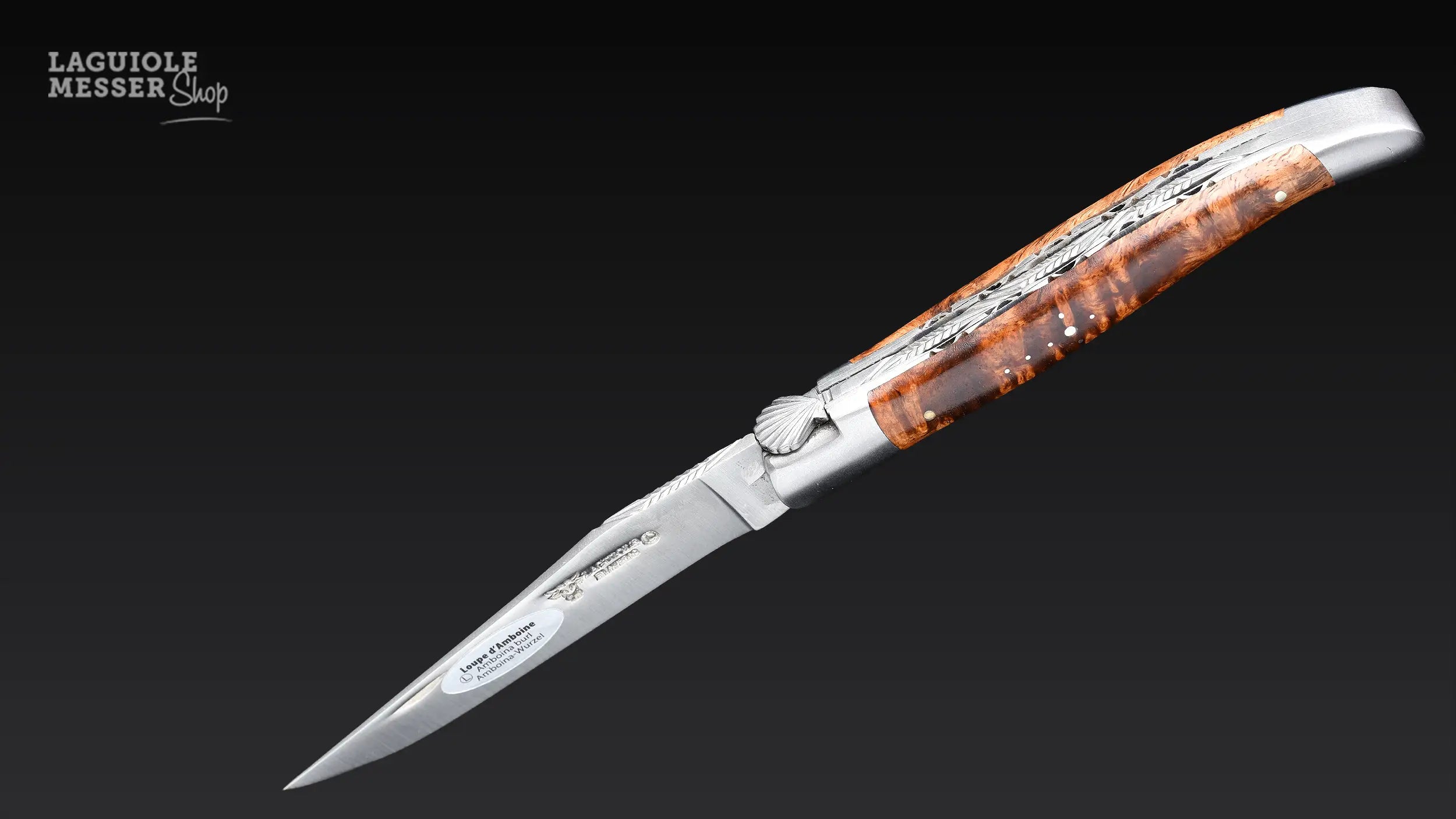 Laguiole en Aubrac Taschenmesser mit Griff aus Amboniawurzelstock  und Coquille St. Jacques, geöffnet