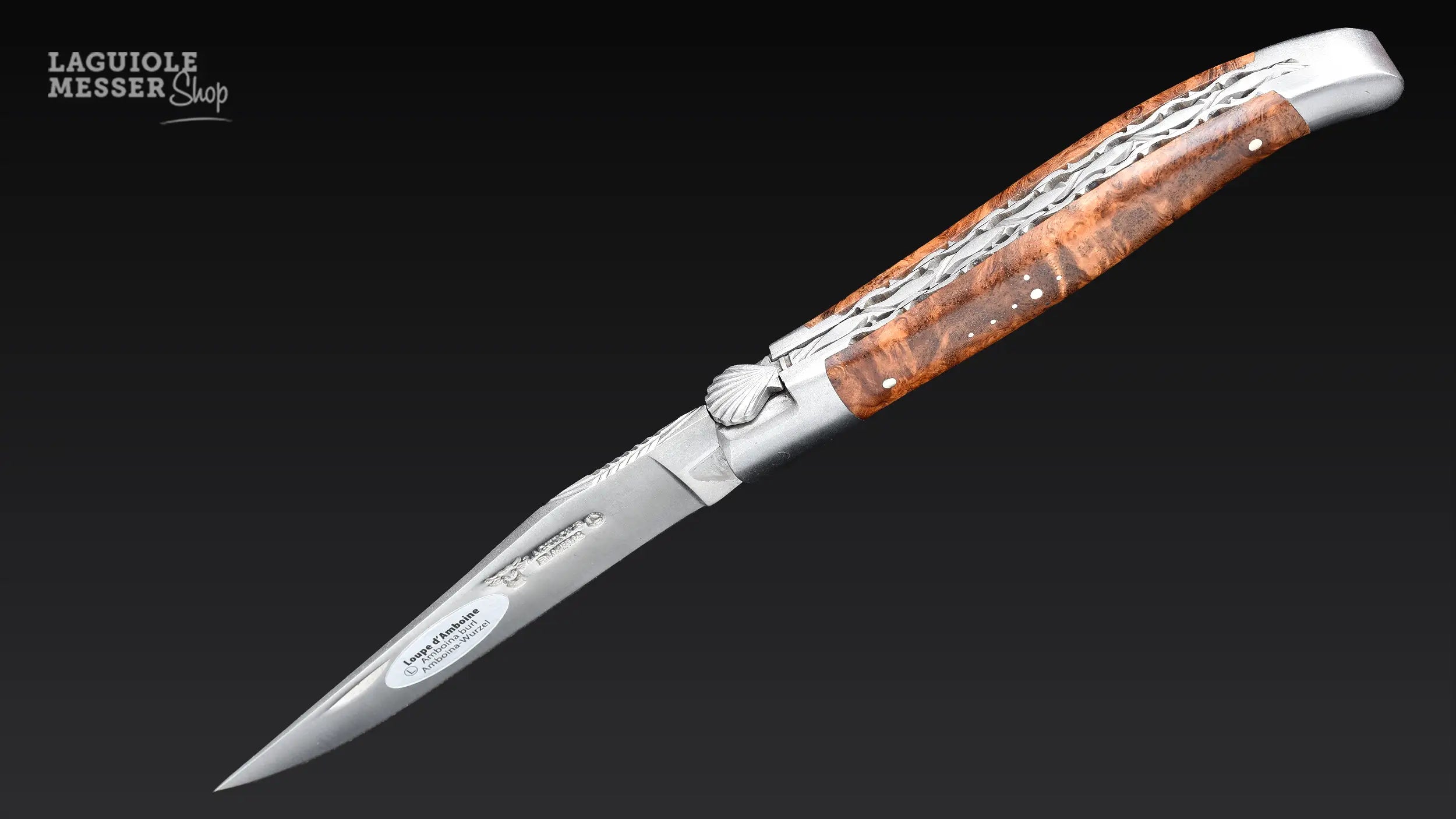 Laguiole en Aubrac Taschenmesser mit Griff aus Amboniawurzelstock  und Coquille St. Jacques, geöffnet