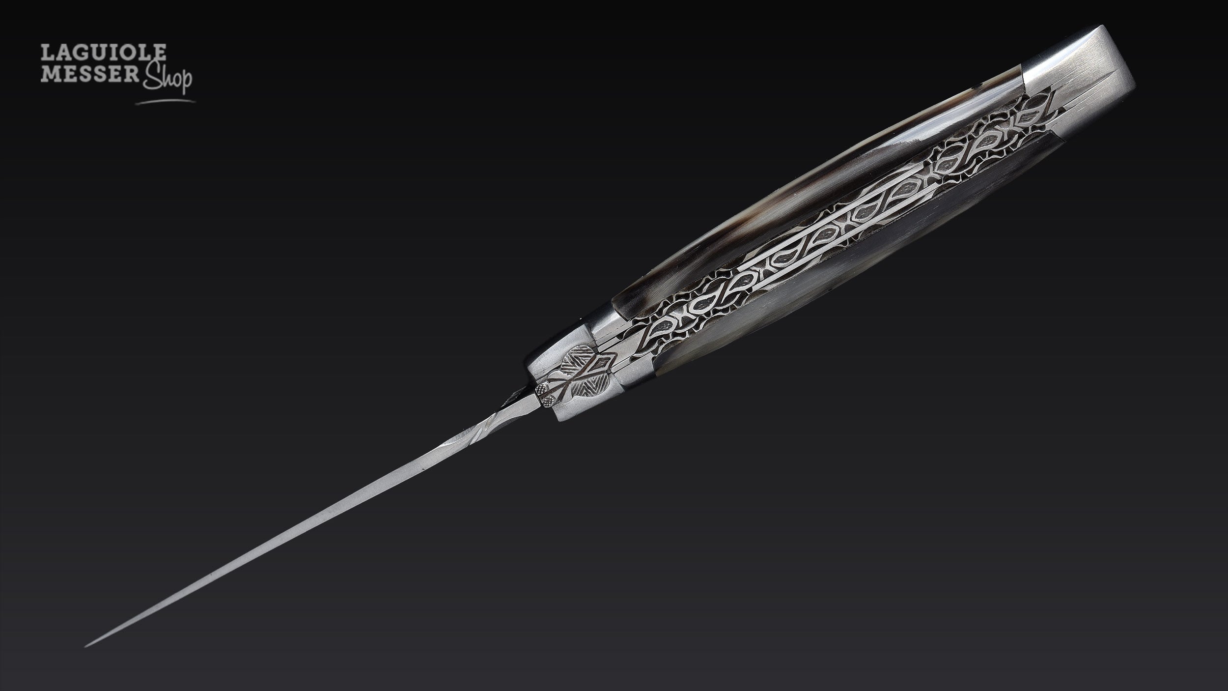 Laguiole en Aubrac Taschenmesser mit Hornspitze, Mouche No 12 und kunstvoll gearbeitetem Ressort
